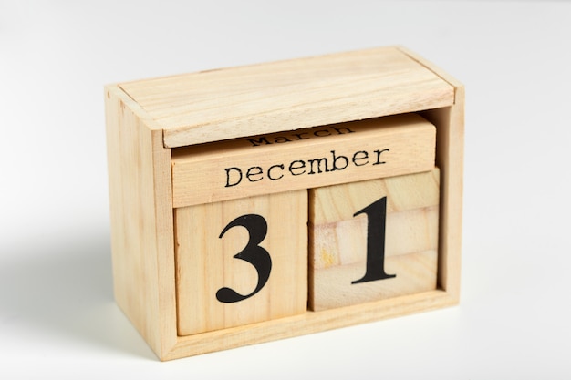 Wooden cubes with date on white background. 31st of December