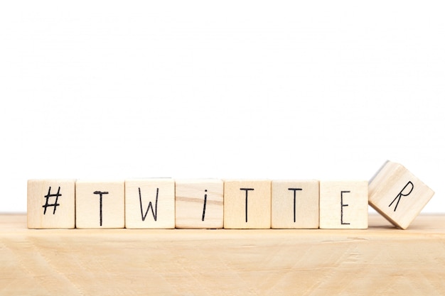 Wooden cubes with a hashtag and the word twitter, social media concept