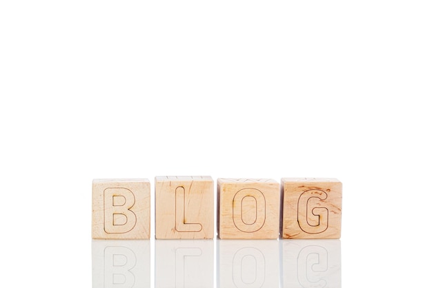 Wooden cubes with letters Blog on a white background