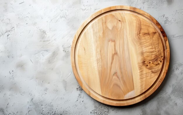 A wooden cutting board sits on a grey countertop