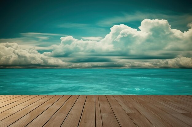 A wooden deck with a sea view and the sky with clouds.