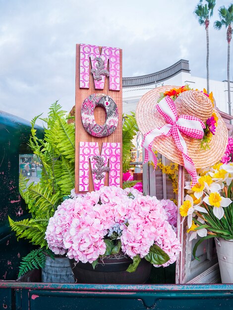 Wooden decor and flowers for mother's day. 