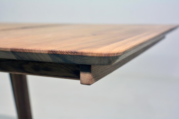 wooden dinner table surface natural wood furniture close view solid wood table top background for video or photo production