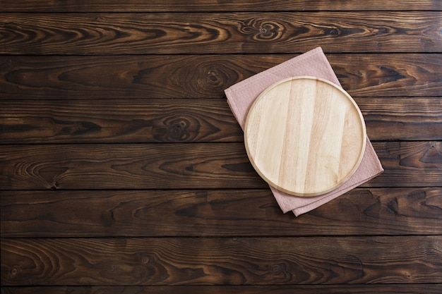 Wooden dishes on  old wooden table