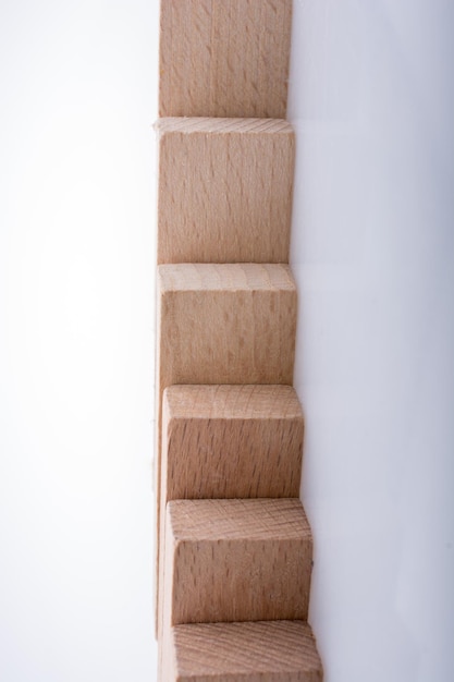 Wooden domino blocks on white background