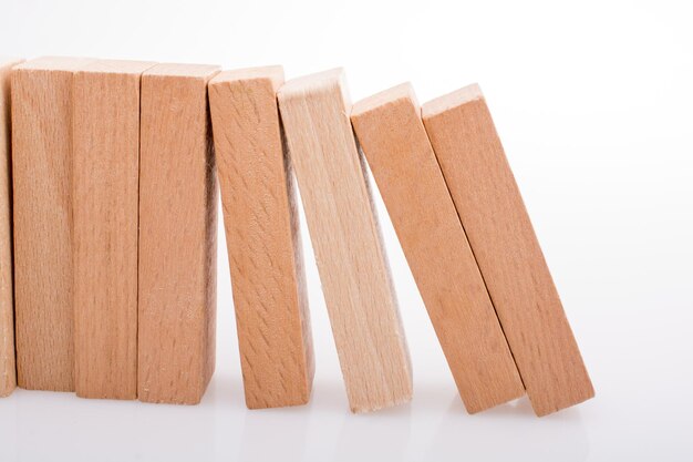 wooden domino blocks on white background
