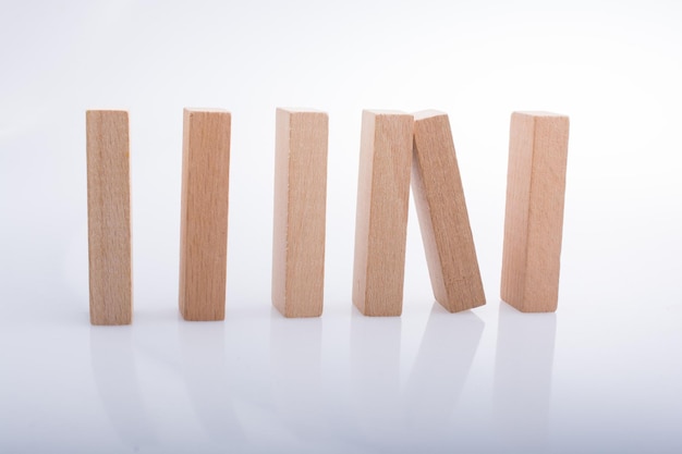 wooden domino blocks on white background