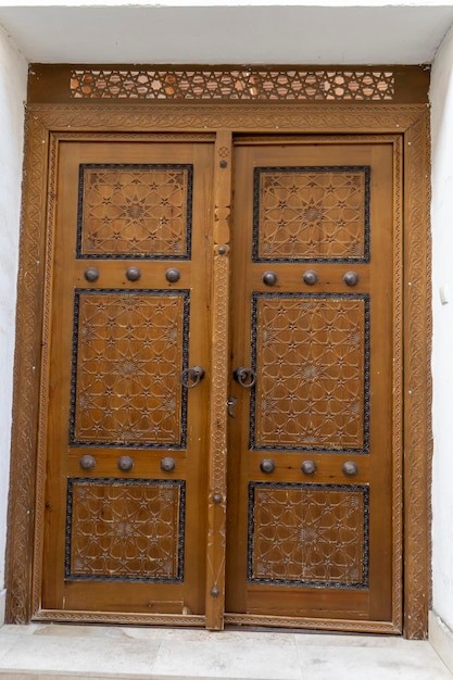 A wooden door in a frame