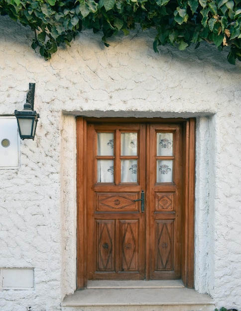 A wooden door with a light on it