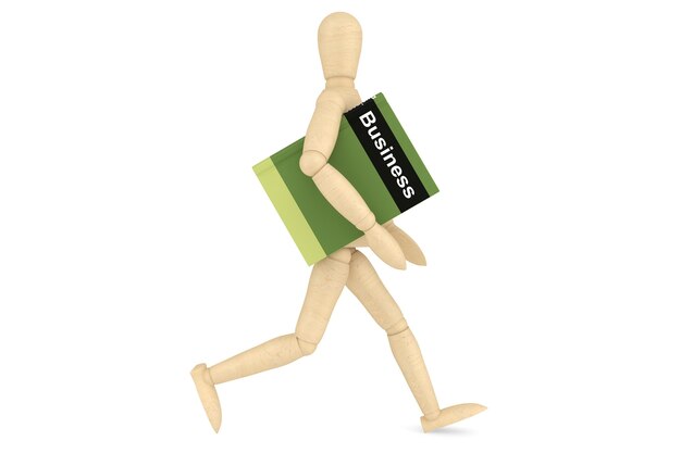 Wooden Dummy with book on a white background