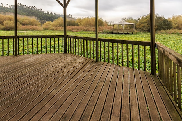 Photo wooden fence on field against sky