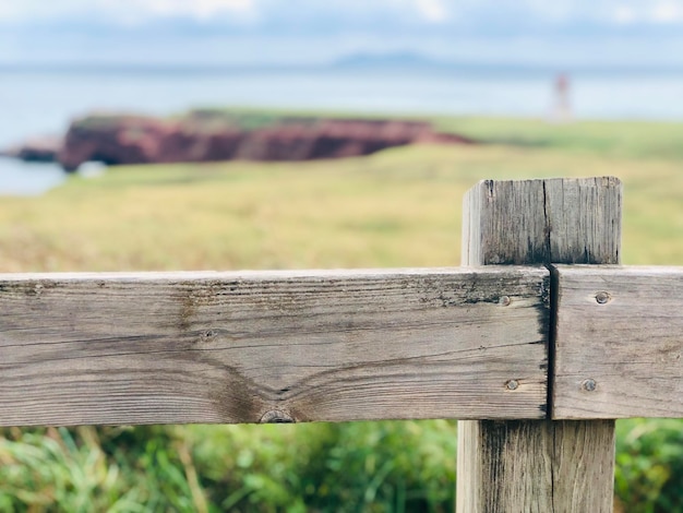 Wooden fence on field