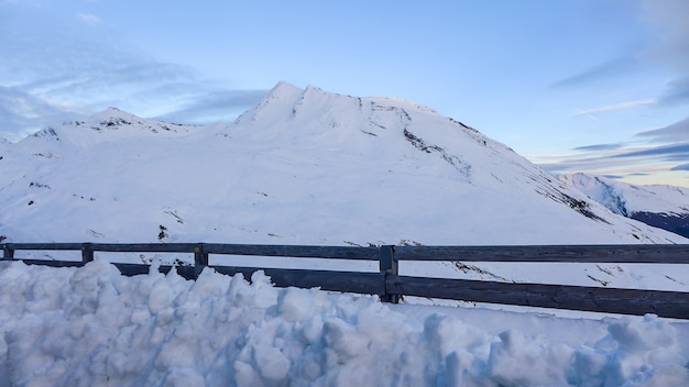 Wooden fence on the snow