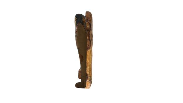 Photo a wooden figure of a man with a black face and a black face.