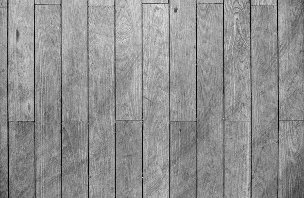 Wooden floor from planks in black and white as background