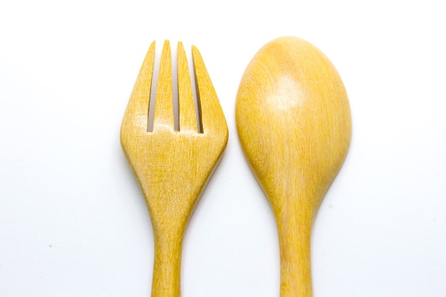 wooden fork and spoon isolated on white background 