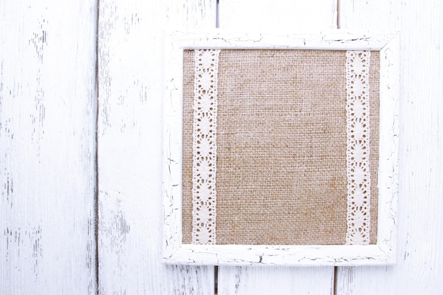 Wooden frame on wooden background