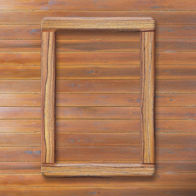 Photo wooden frame on wooden background