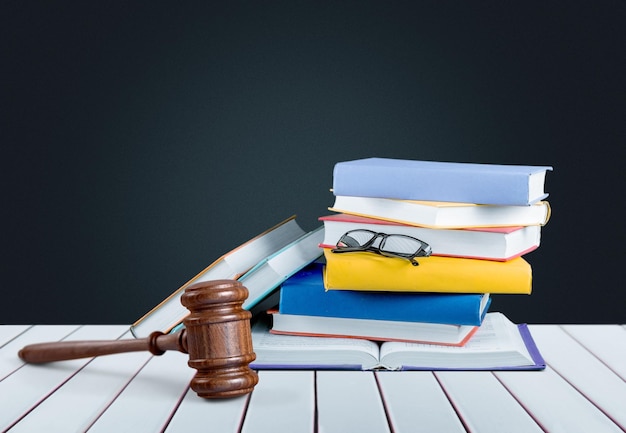 wooden gavel and books, law and justice concept