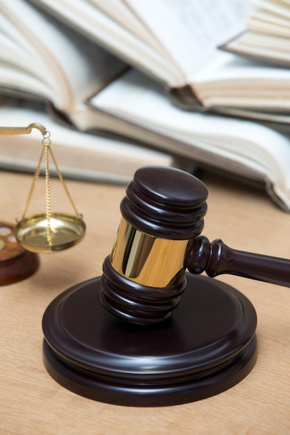 Wooden gavel and books