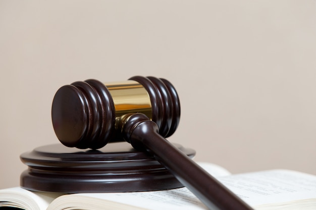 Wooden gavel and books