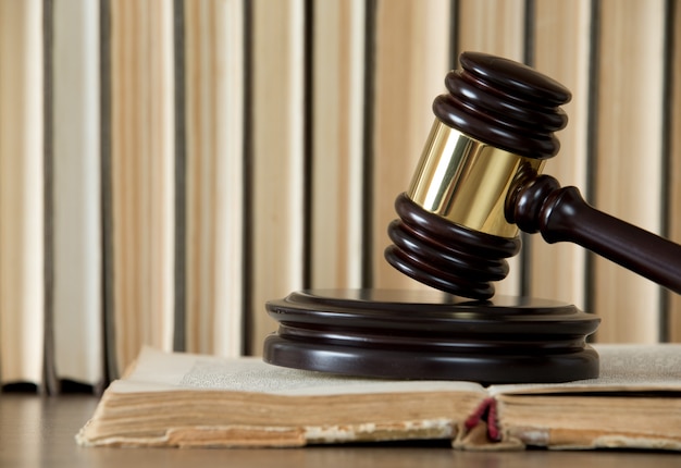 Wooden gavel and books