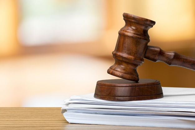 Wooden gavel on table 