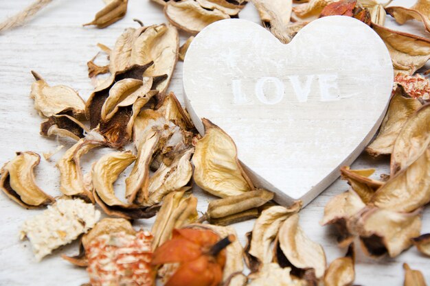 Wooden heart with the word love written