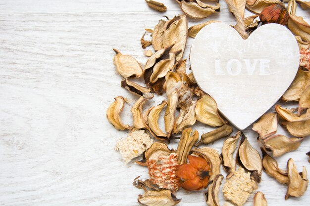 Wooden heart with the word love written