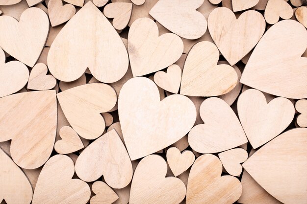 Wooden hearts on the wooden table