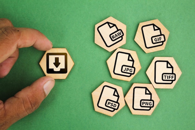 Photo wooden hexagon with save file icon or download file format jpeg png gif tiff psd and raw file