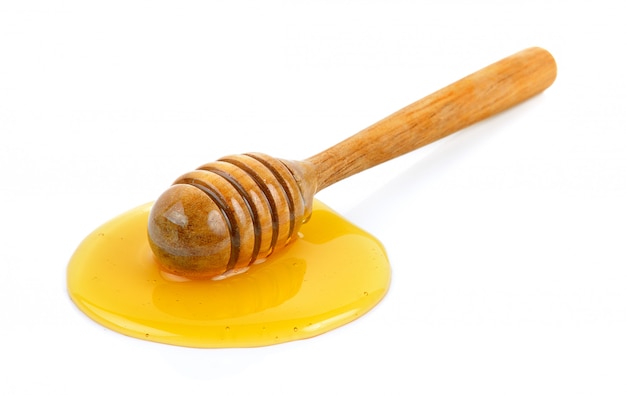 Wooden honey dipper with honey