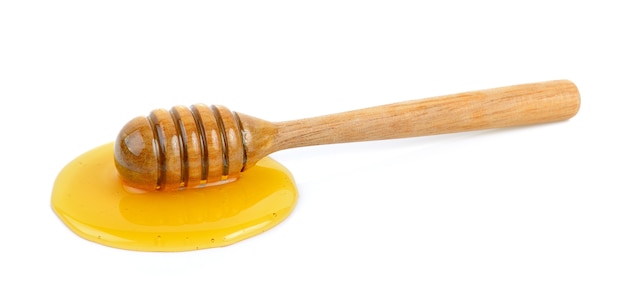 蜂蜜と木製の蜂蜜のディッパー