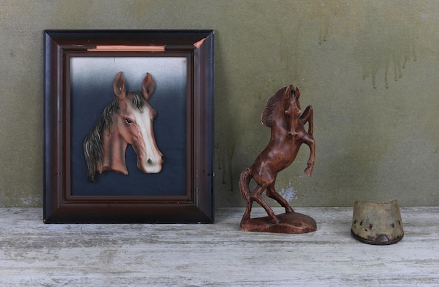 wooden horse figurine on a wooden table