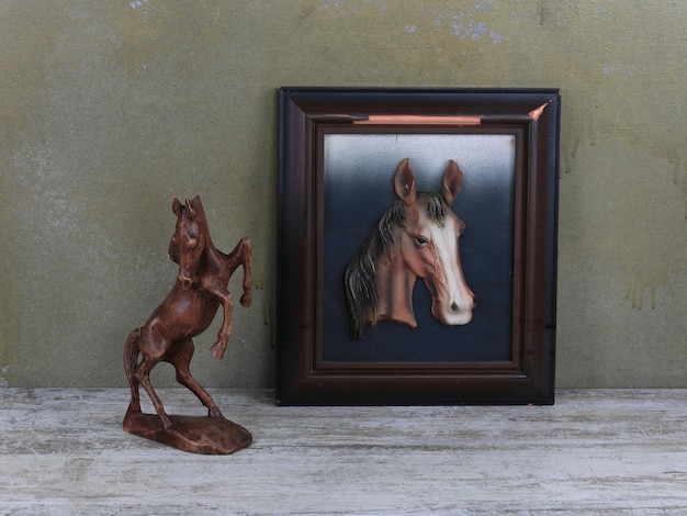 wooden horse figurine on a wooden table