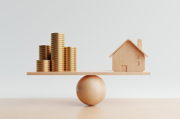 Wooden house and golden coin on balancing scale on white background Real estate business mortgage