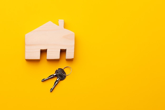 Wooden house model miniature and house keys