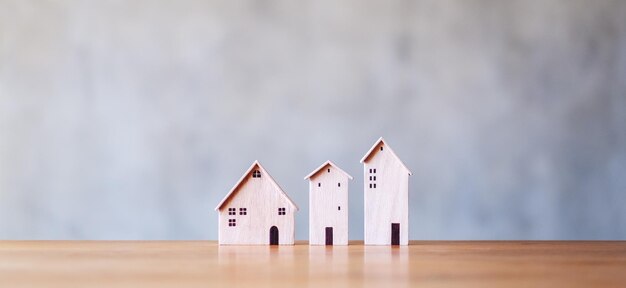 Wooden house models on the table