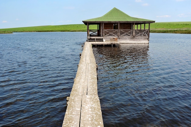 Wooden house on a pond to relax fishermen