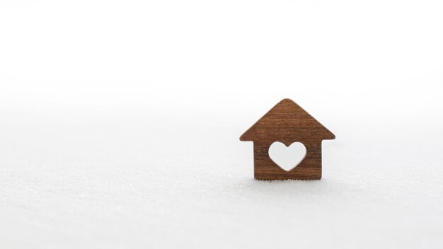 Wooden house in the snow