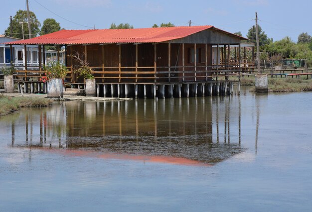 Wooden houses on stilts in a fishing village Tourlida in Mesolongi in Greece