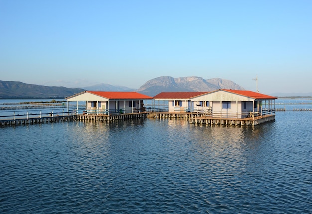 Wooden houses on stilts in a fishing village Tourlida in Mesolongi in Greece