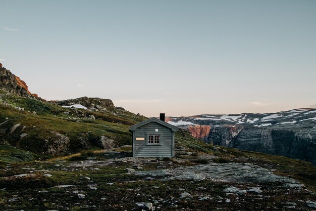 Wooden hut in the Norwegian mountains in the trail for Trolltunga
