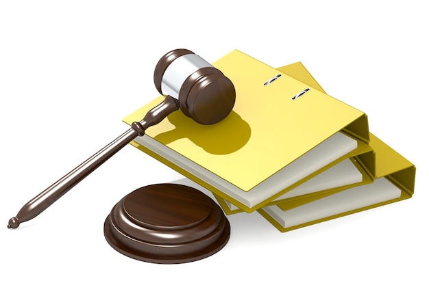 Wooden judge gavel and yellow folder