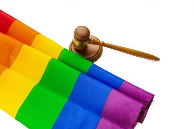 Wooden judge mallet and lgbt rainbow flag