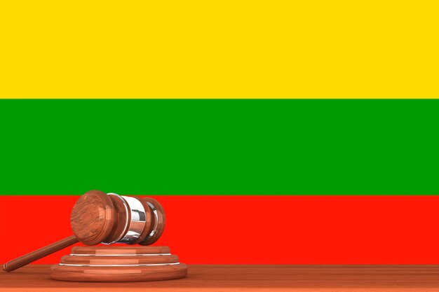 Wooden justice gavel with flag of lithuania