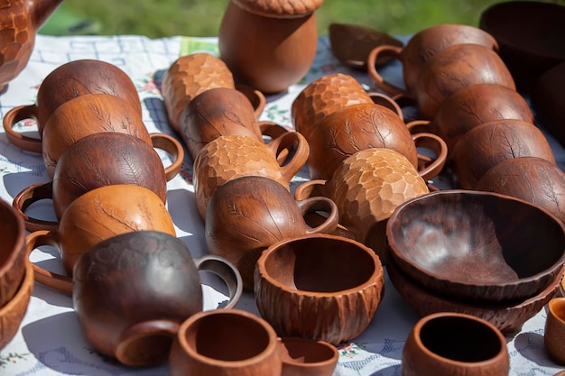 Wooden kitchen cups and bowls are sold at the fair
