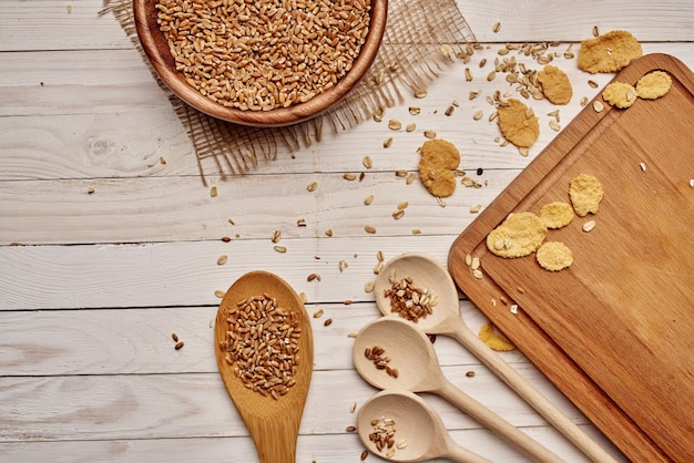 Wooden kitchen items natural ingredients wood background High quality photo