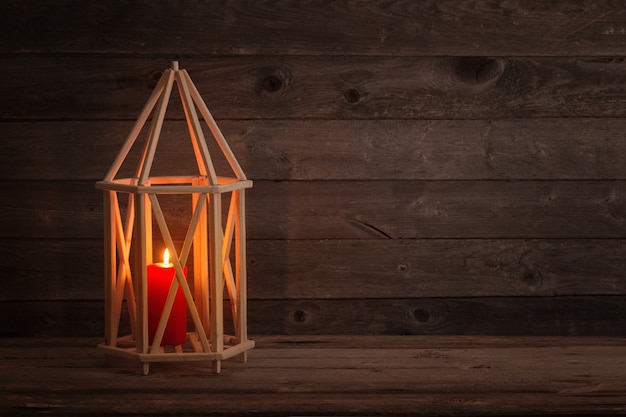 Wooden lantern on old rustic scene