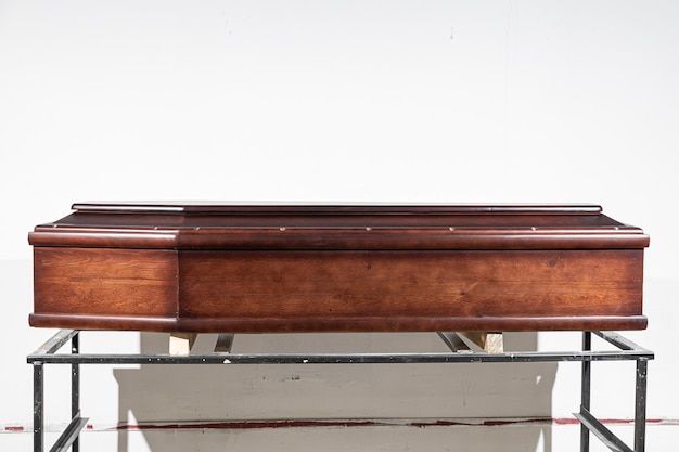 Wooden laquered coffin for sale in a special ritual store